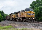 GE and EMD units lead a coal train north at Ashland Ave